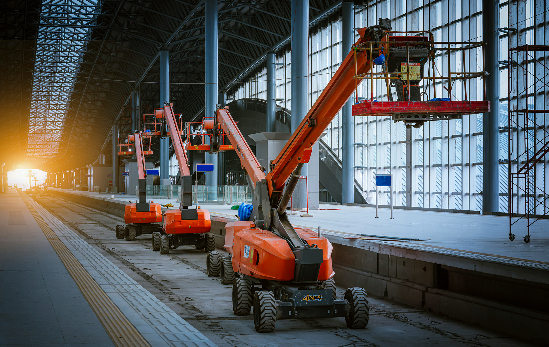 Boom lifts on a construction site