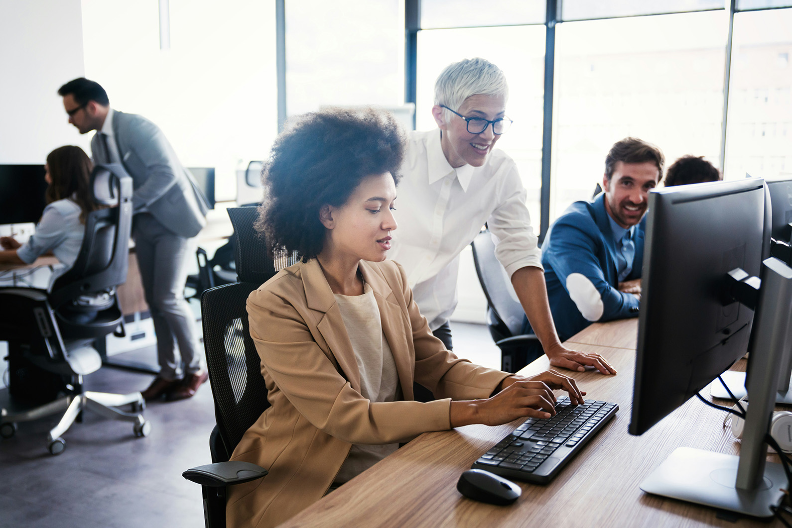 Consultants working together in an office